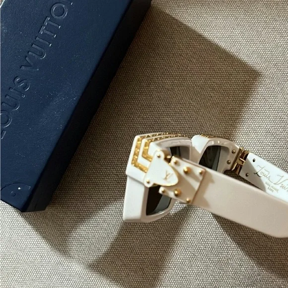 Louis Vuitton 1.1 Millionaires Sunglasses

$895.00 + tax unisex, good condition - Picture 6 of 6